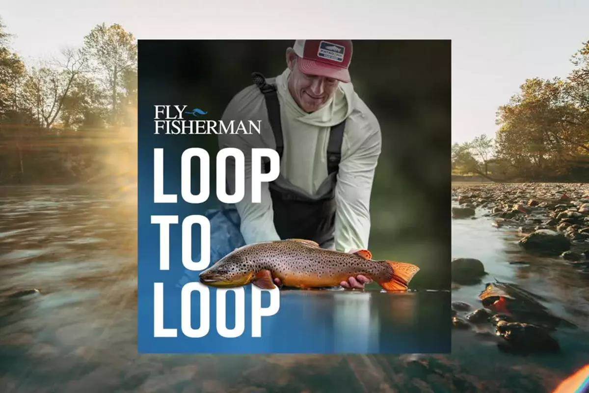 A graphic of a fly angler holding large brown trout. 