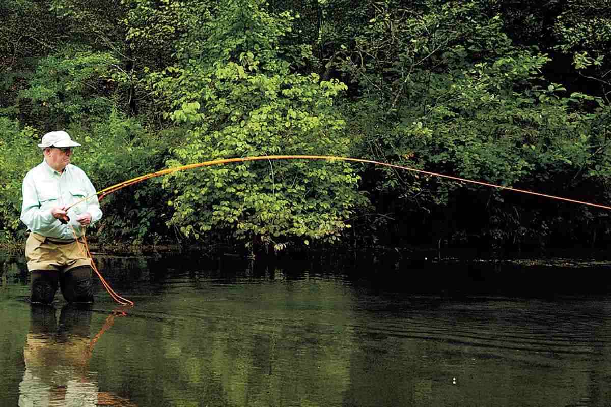 Fly angler Lefty Kreh demonstrates a casting technique.