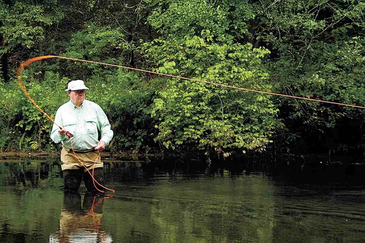 Fly angler Lefty Kreh demonstrates a casting technique.