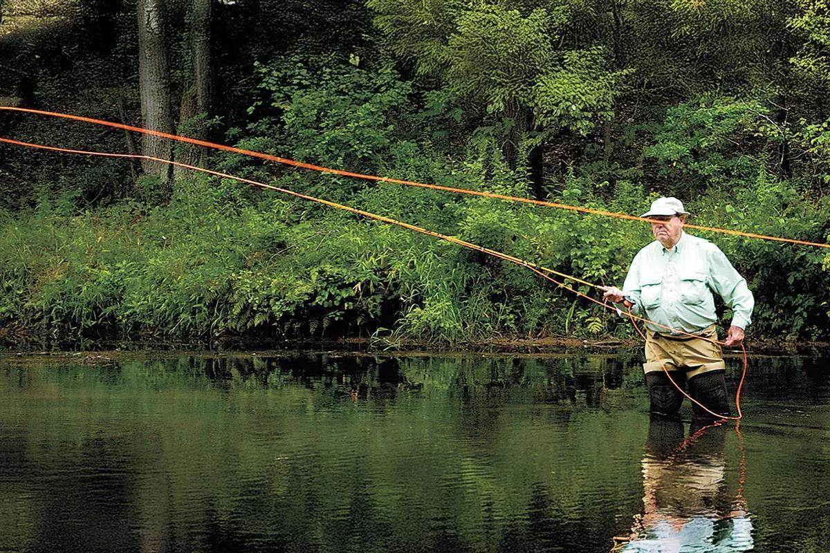 Fly angler Lefty Kreh demonstrates a casting technique.